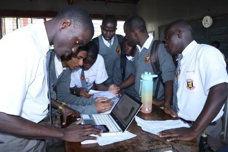 Students celebrating the completion of a class project